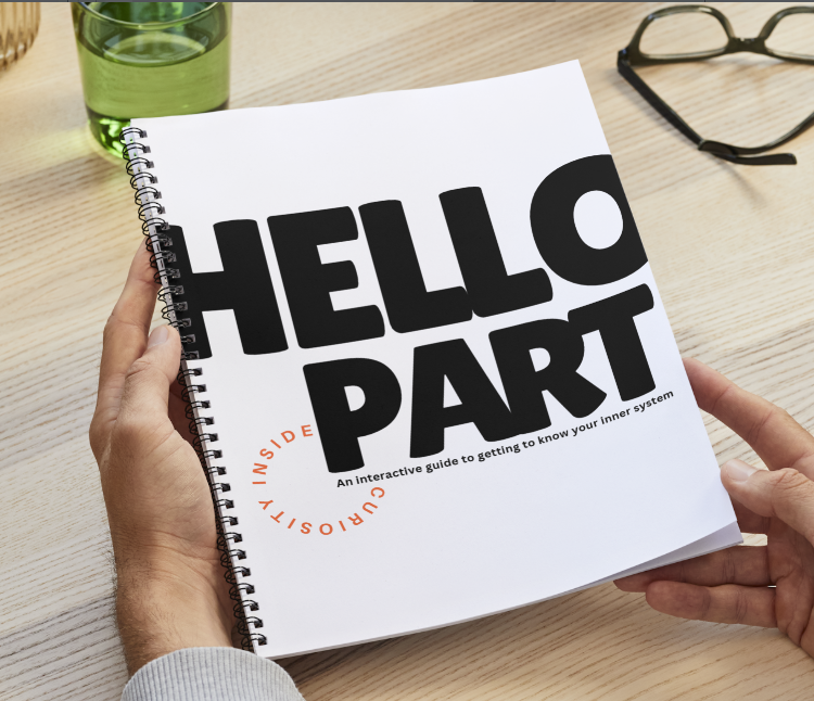 Hello Part workbook held in hands